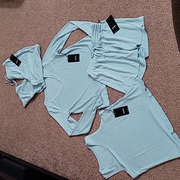 4 piece lounge set. NEW WITH TAGS. by Discover Peach. Size XS